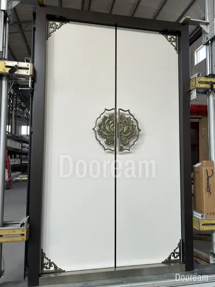 White double door with a bronze medallion, photographed on our floor