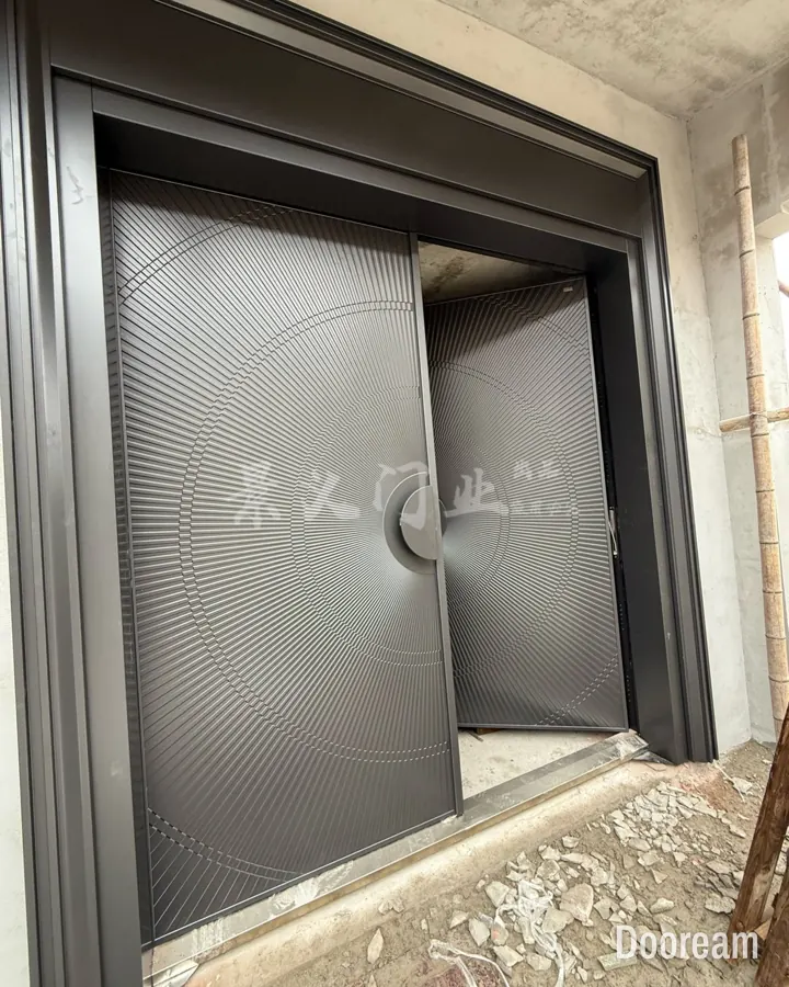 Grey double door with a radial line relief, shown open, installed at a client's home